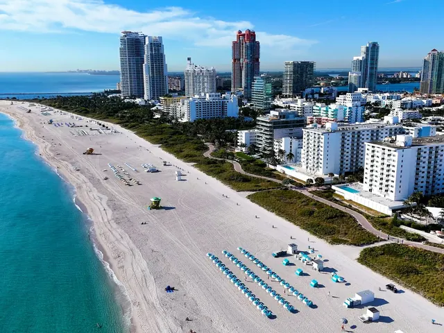 South Beach coastline with turquoise water, sand and oceanfront buildings