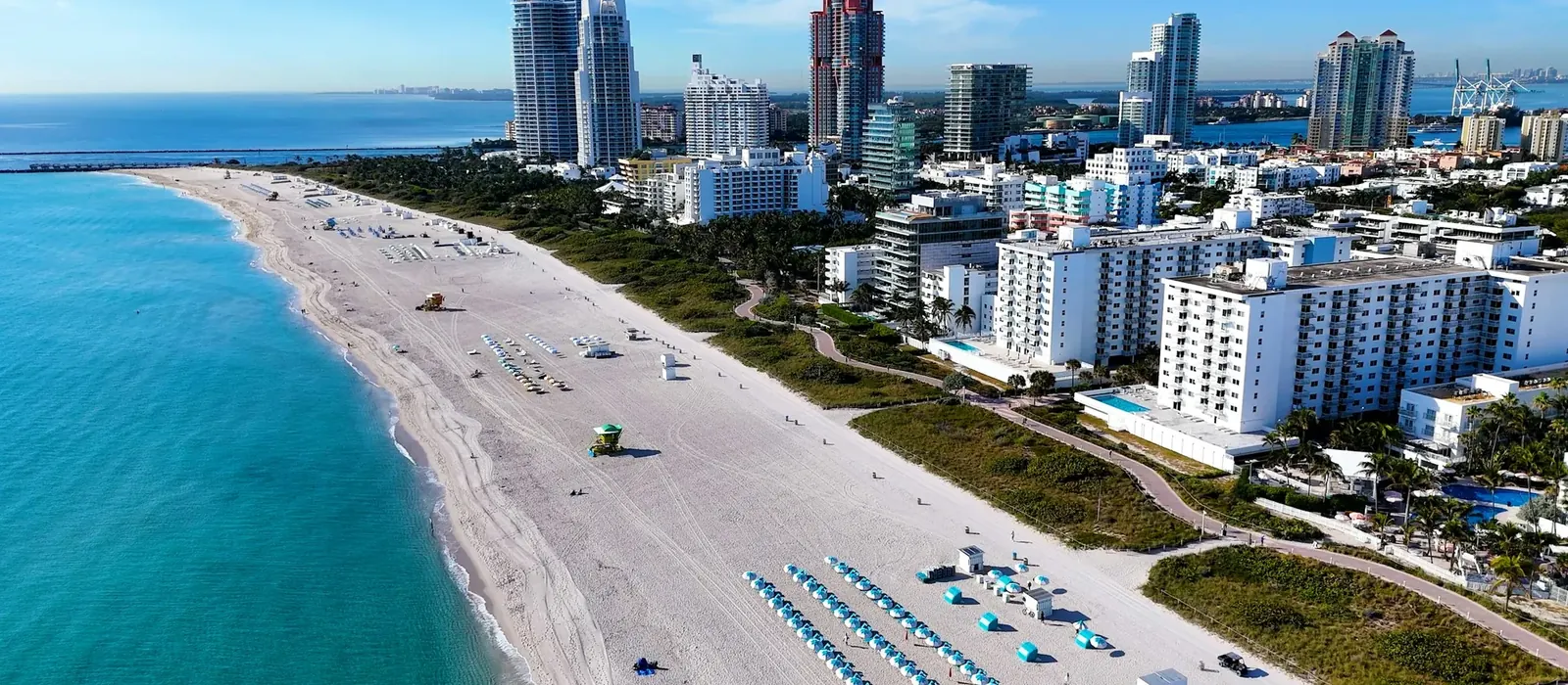 South Beach coastline with turquoise water, sand and oceanfront buildings